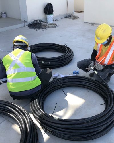 Workers with Cable square